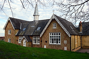 The old junior school - built 1856 adjoining the churchyard - March 2014